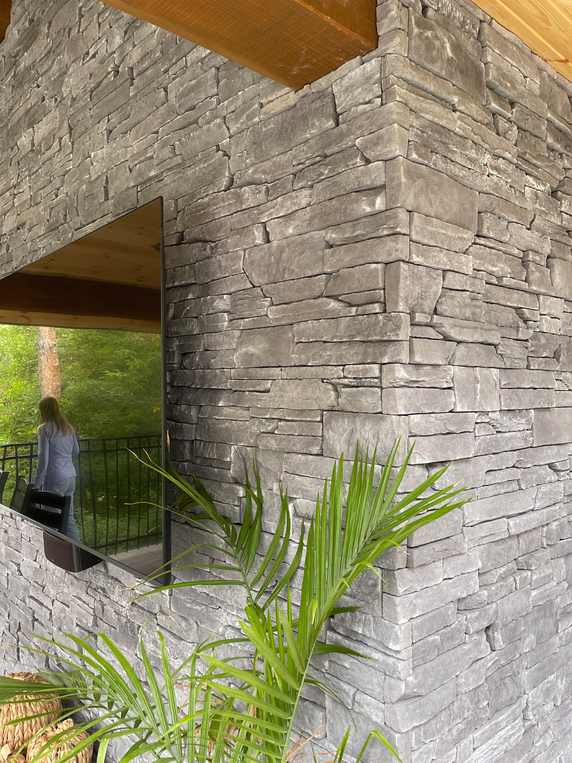 Sedistone stone veneer corner beside an outdoor kitchen